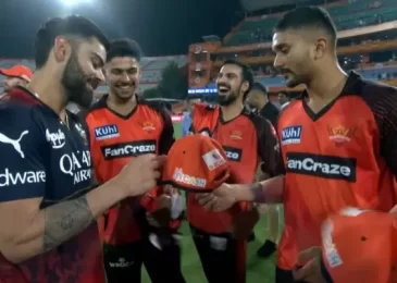 Watch: Centurion Kohli signs bat, jersey, and cap for SRH youngsters