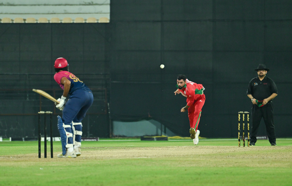 Oman’s pacer Bilal Khan in action against the UAE in the final in Doha on Saturday